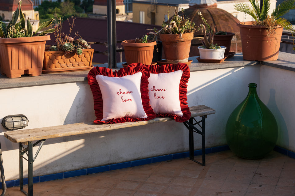 Choose Love Cushions on a roof terrace in Naples